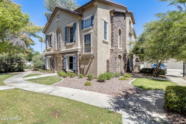 5734 S 21st Pl, Phoenix, AZ 85040 - view of front facade with stone siding and stucco siding