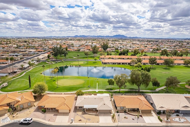 bird's eye view featuring a residential view, a water and mountain view, and view of golf course