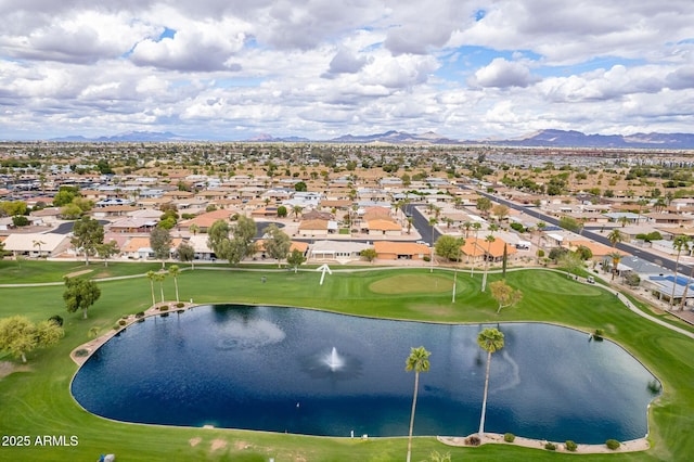 aerial view featuring a residential view, a water and mountain view, and golf course view