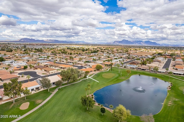 aerial view featuring a residential view and a water and mountain view