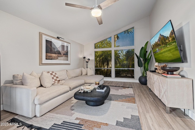 7821 N Via De La Sombre, Scottsdale, AZ 85258 - living room with wood finished floors, vaulted ceiling, and a ceiling fan
