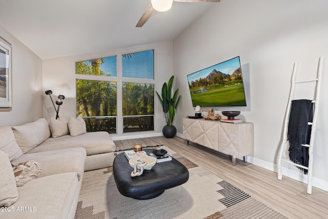 7821 N Via De La Sombre, Scottsdale, AZ 85258 - living area with wood finished floors, baseboards, and ceiling fan