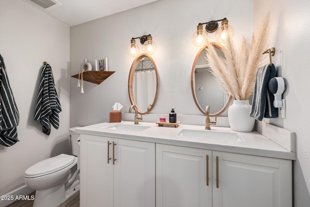 7821 N Via De La Sombre, Scottsdale, AZ 85258 - full bathroom with toilet and double vanity