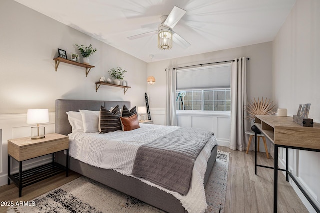 7821 N Via De La Sombre, Scottsdale, AZ 85258 - bedroom featuring wood finished floors and a ceiling fan