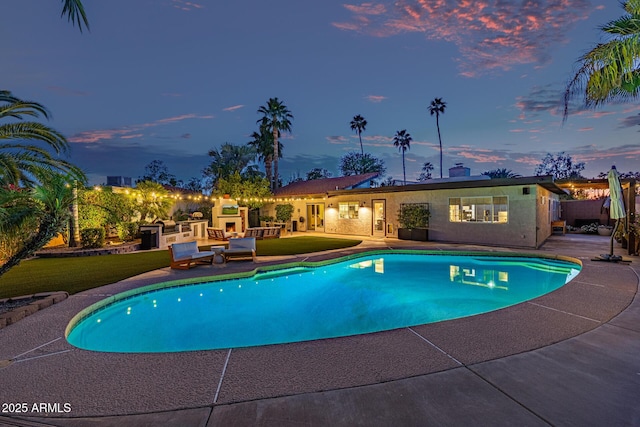 7821 N Via De La Sombre, Scottsdale, AZ 85258 - pool at dusk with a patio, an outdoor pool, and an outdoor hangout area