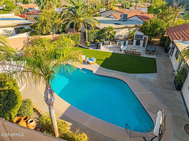 7821 N Via De La Sombre, Scottsdale, AZ 85258 - view of swimming pool featuring exterior kitchen and a patio area