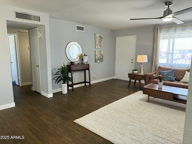 433 S 113th Pl, Mesa, AZ 85208 - living area with plenty of natural light, a ceiling fan, and dark wood-type flooring