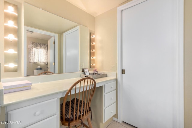 bathroom featuring tile patterned floors and vanity