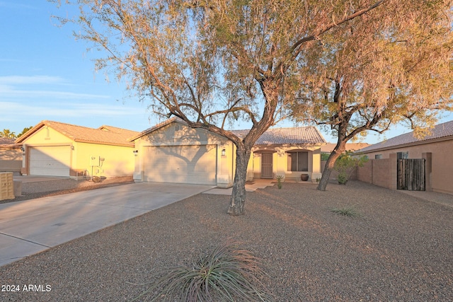 single story home with a garage