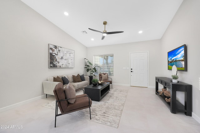 living room featuring ceiling fan and vaulted ceiling