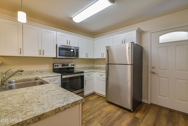 860 W Rd 1 S, Chino Valley, AZ 86323 - kitchen featuring light countertops, stainless steel appliances, white cabinetry, and a sink