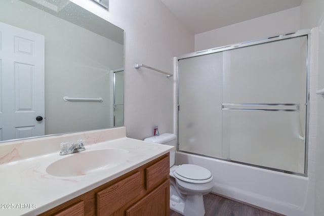 860 W Rd 1 S, Chino Valley, AZ 86323 - full bath with toilet, combined bath / shower with glass door, wood finished floors, and vanity