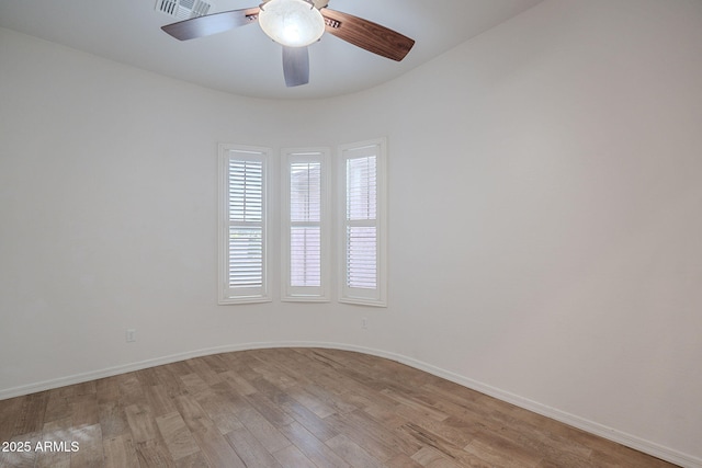 6230 W Montebello Way, Florence, AZ 85132 - empty room featuring light wood finished floors and a ceiling fan