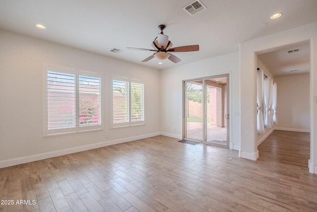 6230 W Montebello Way, Florence, AZ 85132 - spare room with ceiling fan, light wood-type flooring, and recessed lighting
