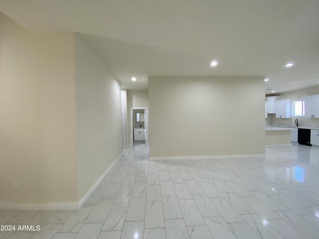 38712 W Sherman St, Tonopah, AZ 85354 - spare room featuring recessed lighting, a sink, baseboards, and light marble finish floors