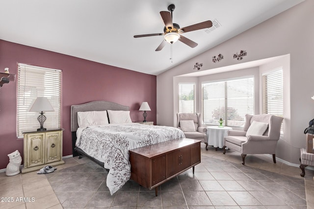 bedroom with tile patterned flooring, vaulted ceiling, and ceiling fan