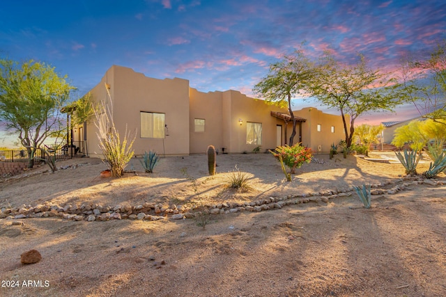 view of pueblo revival-style home