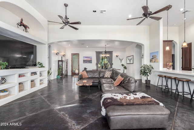 14129 E Barbie Ln, Scottsdale, AZ 85262 - living area with arched walkways, ceiling fan, and a towering ceiling