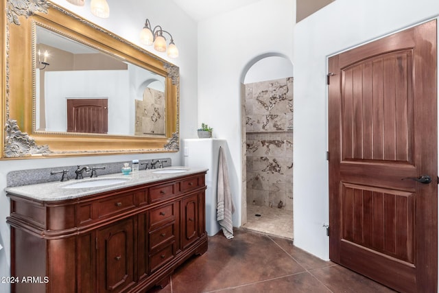14129 E Barbie Ln, Scottsdale, AZ 85262 - full bath with double vanity, a tile shower, and finished concrete floors