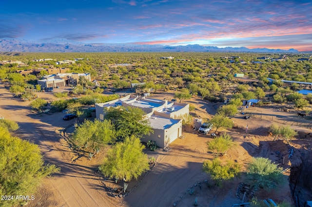 aerial view at dusk with a mountain view