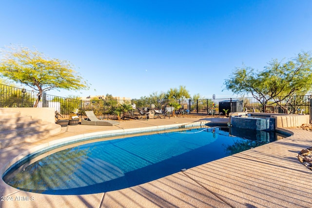 14129 E Barbie Ln, Scottsdale, AZ 85262 - view of swimming pool with a pool with connected hot tub and a patio area