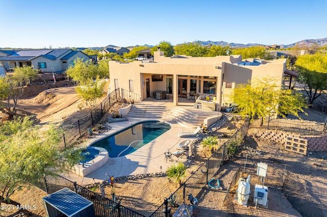 14129 E Barbie Ln, Scottsdale, AZ 85262 - view of swimming pool with a patio, a pool with connected hot tub, and a residential view