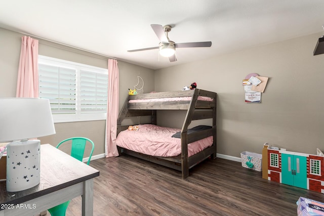 bedroom featuring ceiling fan and dark wood-type flooring