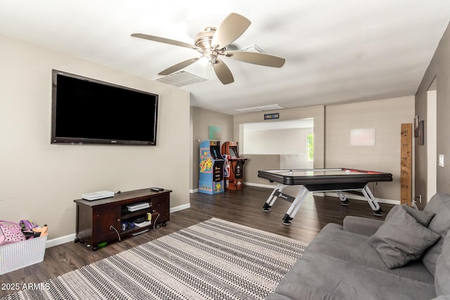 game room featuring ceiling fan and dark hardwood / wood-style flooring