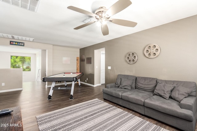 living room with dark hardwood / wood-style flooring, pool table, and ceiling fan