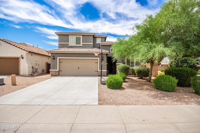 view of front of property with a garage