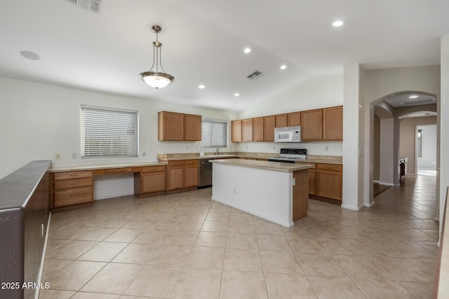 kitchen with pendant lighting, lofted ceiling, a center island, stainless steel dishwasher, and electric stove