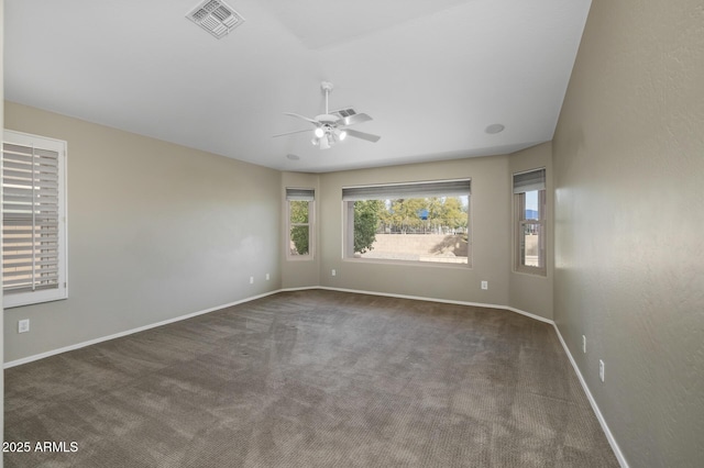 carpeted empty room with ceiling fan