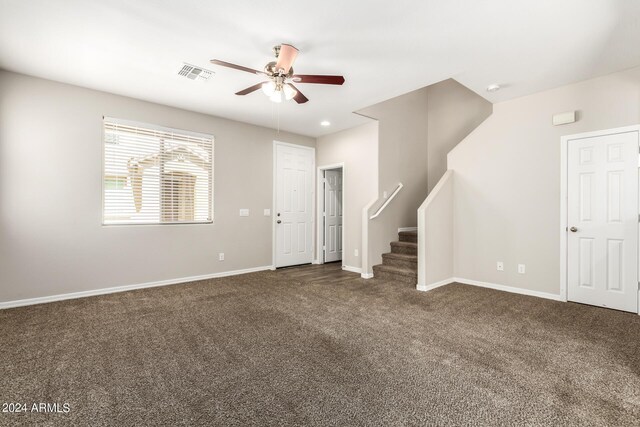 interior space featuring carpet and ceiling fan