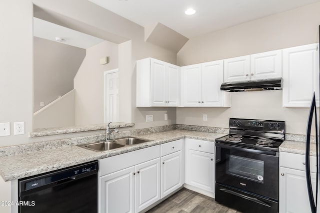 kitchen featuring black appliances, light hardwood / wood-style floors, white cabinetry, and sink