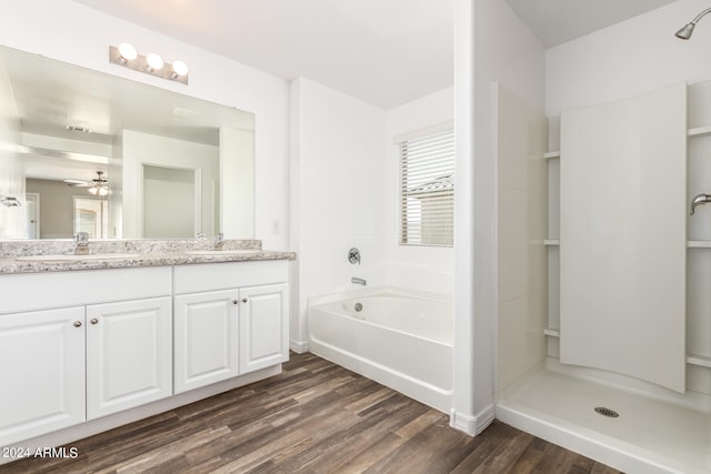 bathroom with vanity, ceiling fan, wood-type flooring, and separate shower and tub