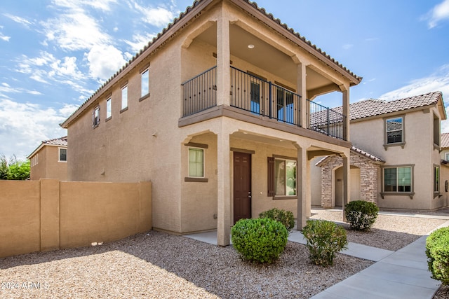 exterior space featuring a balcony