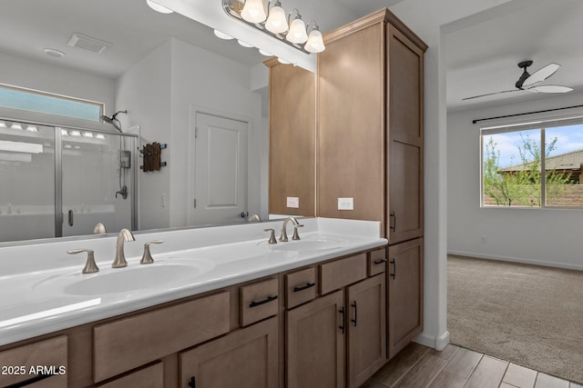 4539 Charro Ct, Wickenburg, AZ 85390 - full bathroom with a shower stall, double vanity, plenty of natural light, and baseboards