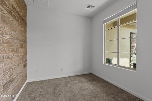 4539 Charro Ct, Wickenburg, AZ 85390 - carpeted spare room featuring baseboards