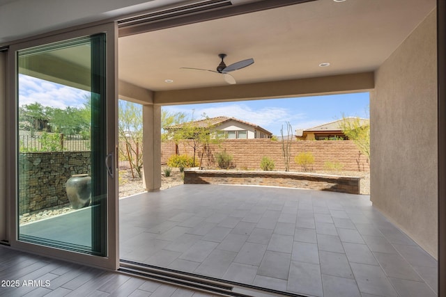 4539 Charro Ct, Wickenburg, AZ 85390 - fenced backyard featuring a ceiling fan and a patio area