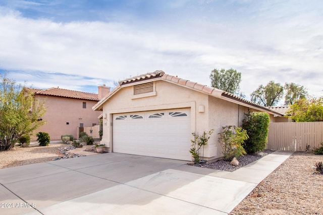 view of front of home with a garage