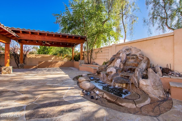 view of patio with ceiling fan