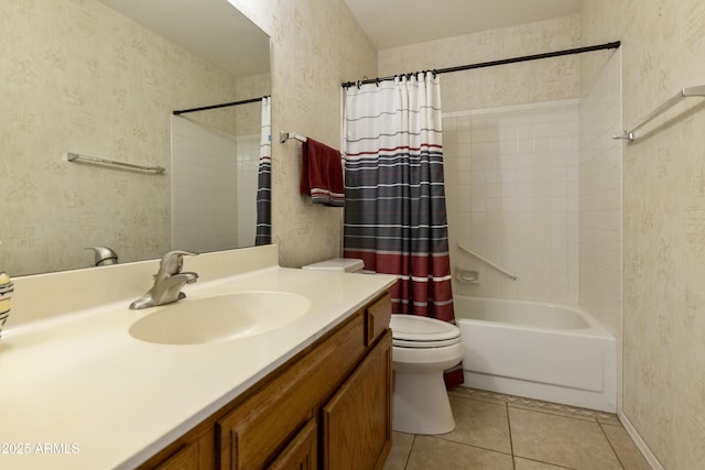 full bathroom with toilet, vanity, tile patterned floors, and shower / bath combo with shower curtain