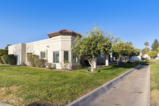 view of front of home featuring a front yard