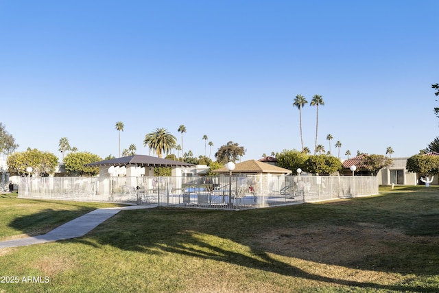 view of yard featuring a fenced in pool