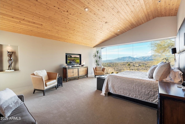 carpeted bedroom with wooden ceiling and high vaulted ceiling