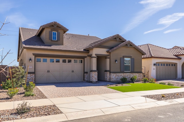 view of front of property with a garage