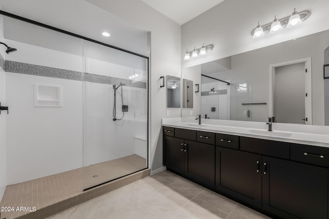 bathroom featuring a shower with shower door and tile flooring