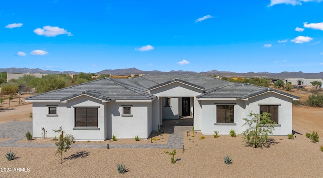 view of front of home featuring a mountain view