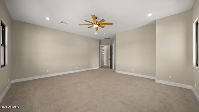 29811 N 154th St, Scottsdale, AZ 85262 - spare room with light carpet, ceiling fan, baseboards, and visible vents