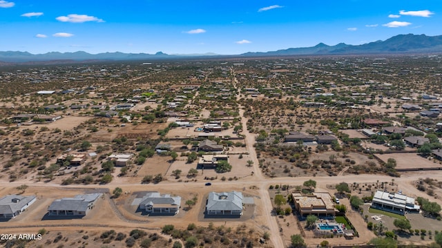 drone / aerial view featuring a mountain view